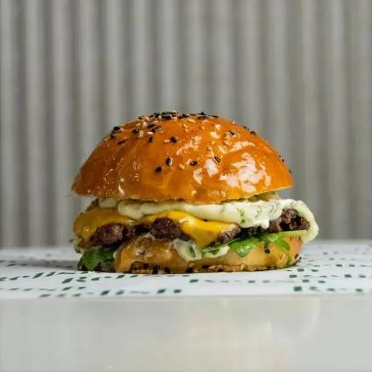 The Relish Wagyu burger on its wrapping paper
